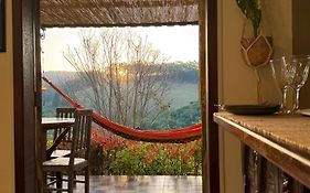 Refúgio com Vista do Pôr do Sol Piscina e Sauna
